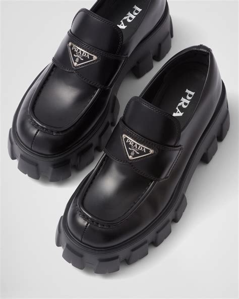 prada monolith brushed leather pointed loafers|Prada high heeled loafers.